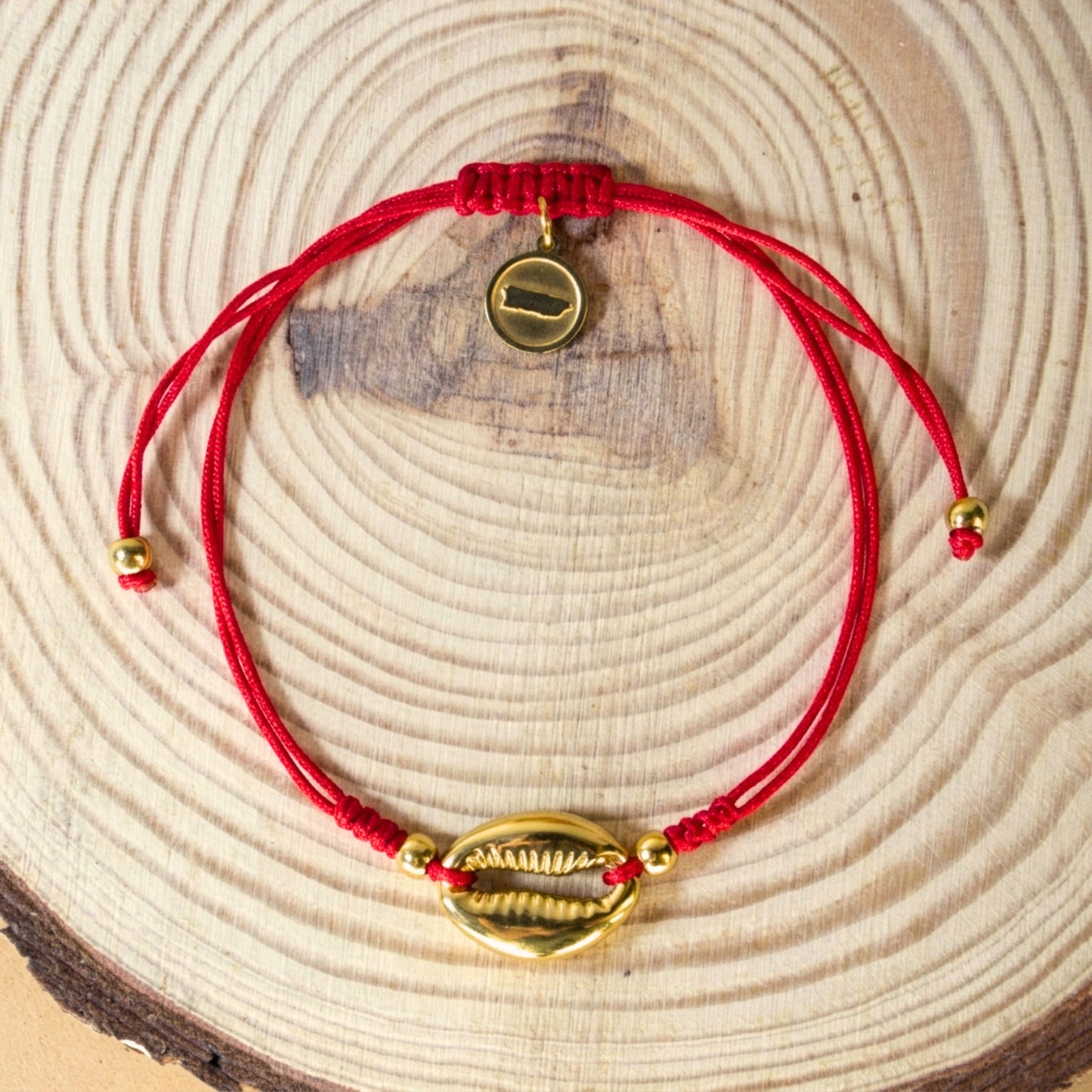 7 Inch Red Adjustable Braided Bracelet with Golden Cowrie Shell