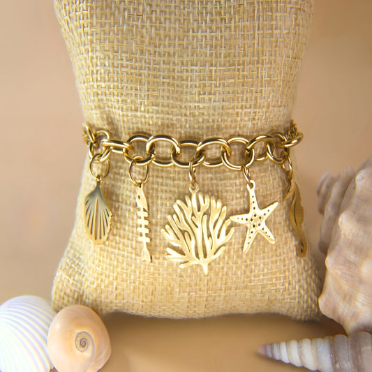 7 Inch Triple Chain Golden Bracelet with Big Chain Links and Golden Sea Life Charm Assortment