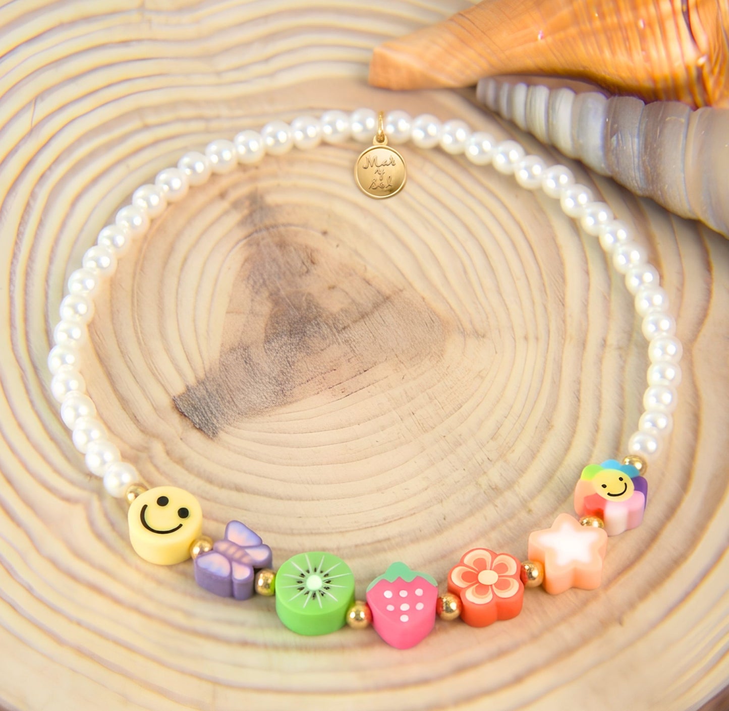 7 Inch Elastic Pearl Bracelet with Stainless Steel and Fimo Beads Assorted Designs